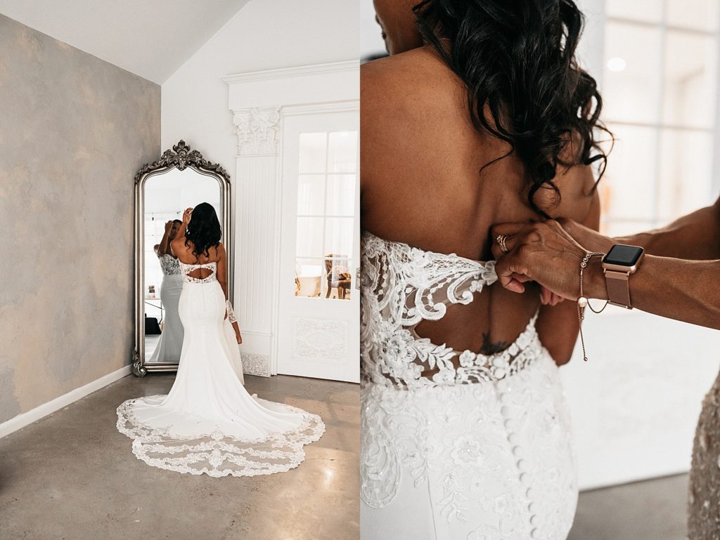 Bride getting ready in front of a large ornate mirror in the getting ready space at The Oak Atelier.