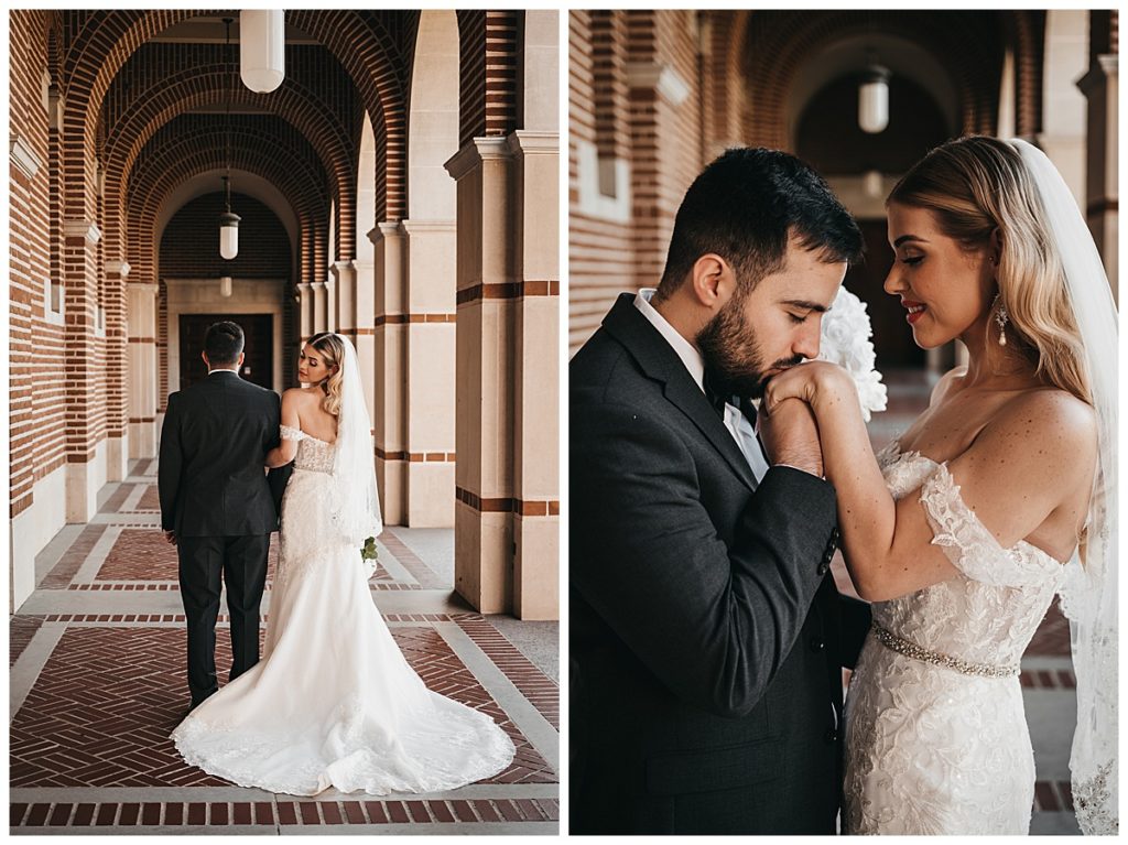 Groom kissing hand of new bride in the hallway at Rice University.